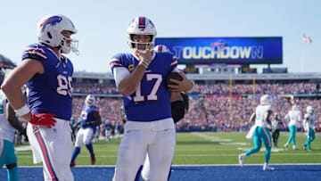 Josh Allen celebrates with his team
