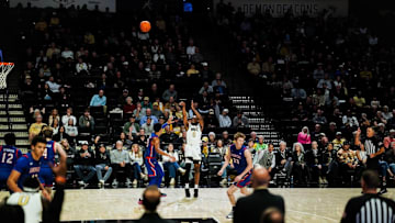 Mekhi Mason shoots a three-pointer for Wake Forest during the game against American