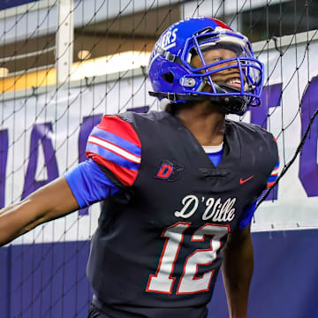 Keelon Russell celebrates scoring a touchdown in the UIL 6A D1 state championship game last season at AT&T Stadium.