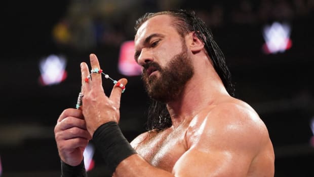 Drew McIntyre wears CM Punk's bracelet after qualifying for the WWE men's Money in the Bank 2024 match.