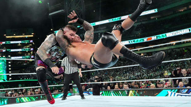 Randy Orton hits an RKO on Kevin Owens