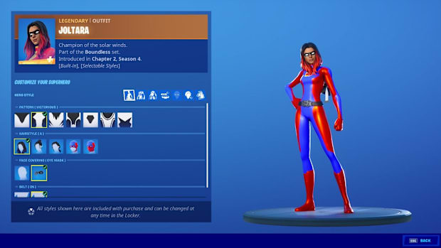 Joltara Fortnite skin. Woman with dip-dyed red and black hair wearing a skin-tight blue and red bodysuit.