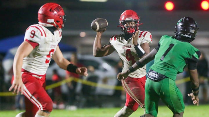 Crestview QB Jayzion Mcqueen looks to make a short pass during the Choctaw Crestview football game at Choctaw.