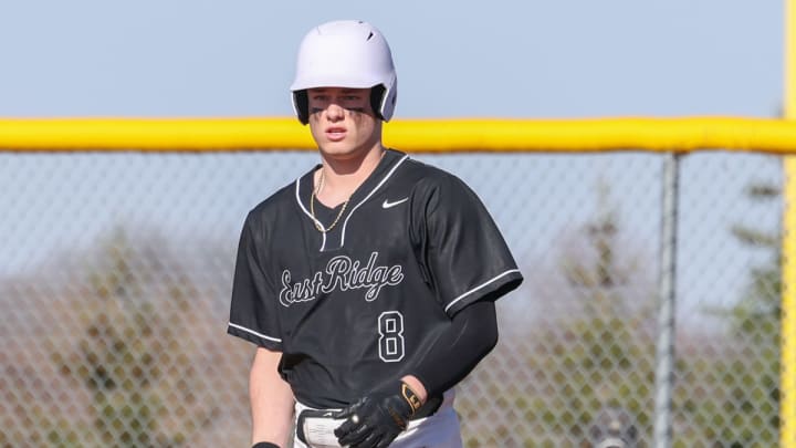 East Ridge's Max Arlich get ready for an at-bat