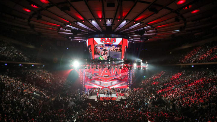 A shot of a live episode of WWE Monday Night Raw from the crowd.