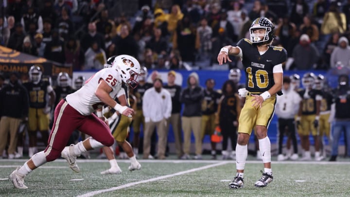 USC commit Julian Lewis throws a pass for Carrollton (Georgia) vs. Mill Creek during the 2022 high school football season.