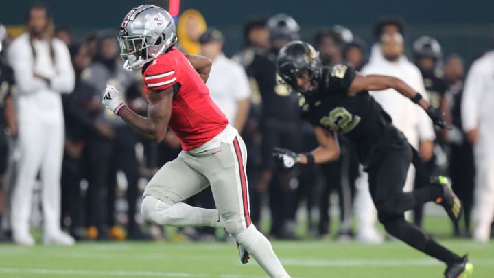 Jalen Lott races downfield during Lovejoy's Texas high school football playoff showdown with South Oak Cliff in November 2023.