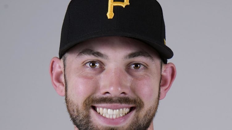 Feb 22, 2023; Bradenton, FL, USA; Pittsburgh Pirates pitcher Carter Bins (80) poses for photos