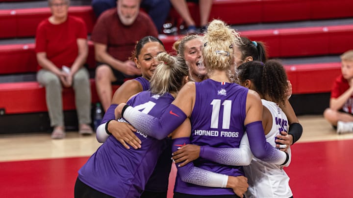 TCU Volleyball players celebrate a win over the Oklahoma Sooners on August 30, 2024. Credit: X:@TCUvolleyball