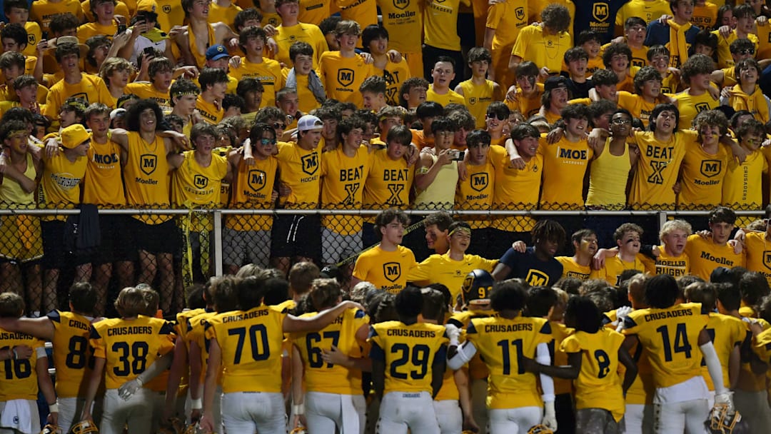 Fans serenade Archbishop Moeller players during a game against St. Xavier.