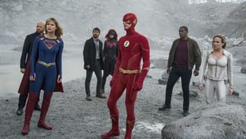 Arrow -- "Crisis on Infinite Earths: Part Four" -- Image Number: AR808A_0125r.jpg -- Pictured (L-R): Jon Cryer as Lex Luthor, Melissa Benoist as Kara/Supergirl, Osric Chau as Ryan Choi, Ruby Rose as Kate Kane/Batwoman, Grant Gustin as The Flash, David Harewood as Hank Henshaw/J'onn J'onzz and Caity Lotz as Sara Lance/White Canary -- Photo: Dean Buscher/The CW -- © 2019 The CW Network, LLC. All Rights Reserved.