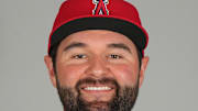 Angels pitcher Jack Dashwood (60) poses during photo day on Feb. 19.