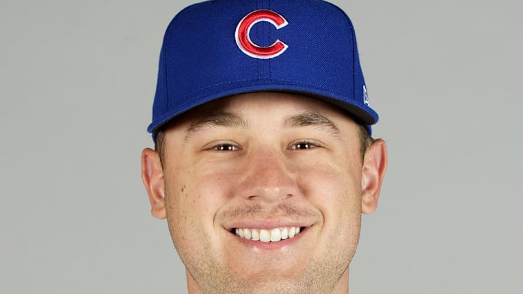 Feb 23, 2023; Mesa, AZ, USA; Chicago Cubs starting pitcher Ryan Jensen (84) poses for images during