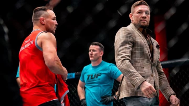 Conor McGregor and Michael Chandler are inside the Octagon during filming for season 31 of "The Ultimate Fighter."