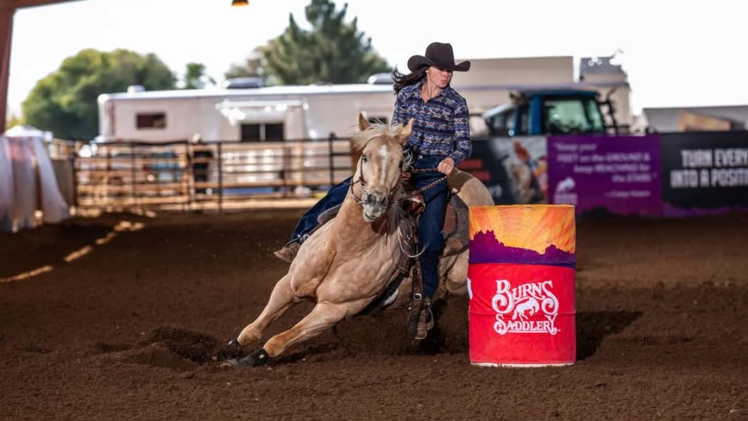 Taylor Cherry and Blazin Sugar Daddy making a run at the Xtreme Barrel Race Arizona.