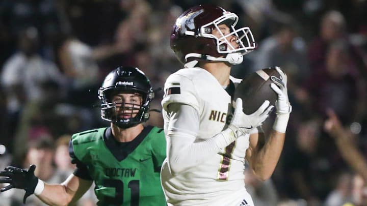 Niceville WR Robert Stith hauls in a touchdown pass during the Choctaw Niceville football game at Choctaw.