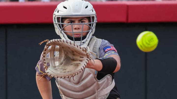 High school softball catchers will now be able to receive one-way communication from their coaches, while on defense, under new rules announced Monday by the NFHS.