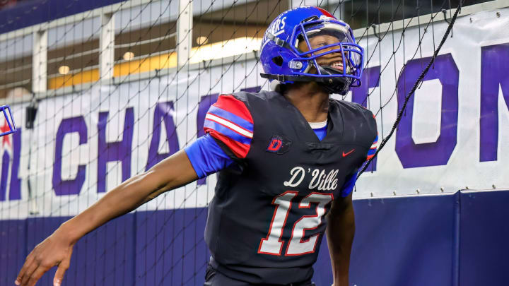 Keelon Russell celebrates scoring a touchdown in the UIL 6A D1 state championship game last season at AT&T Stadium.