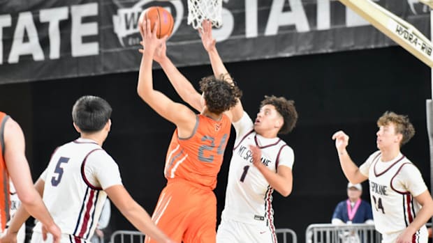 Jaden Ghoreishi, 1, scored a game-high 24 points, leading Mount Spokane past Monroe in Class 3A boys basketball tournament.