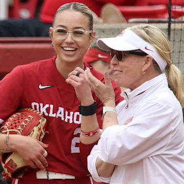 Oklahoma coach Patty Gasso and pitcher Sam Landry