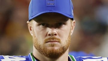 Seattle Seahawks quarterback Sam Darnold looks on