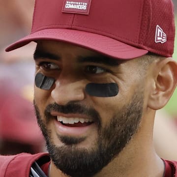 NFL Washington Commanders quarterback Marcus Mariota jayden daniels injury dan quinn playoffs nfl surgery x ray detroit lions nfc east