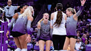 TCU Volleyball players celebrate during their win over West Virginia.