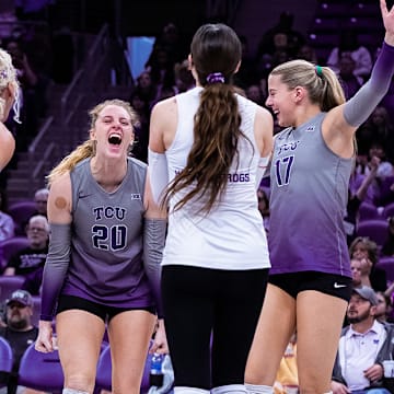 TCU Volleyball players celebrate during their win over West Virginia.