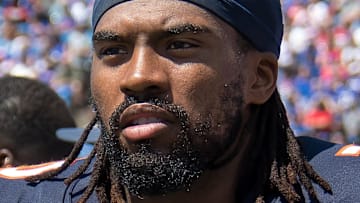 Chicago Bears offensive line Braxton Jones watches from the sidelines.