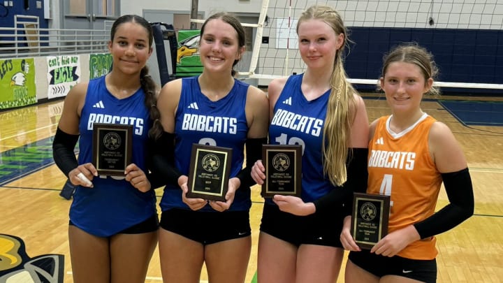 Byron Nelson (Texas) volleyball players (from left) Sophee Peterson, Kylie Kleckner, AJ Seay and Kaitlyn Francis show off some hardware after the Bobcats won the NorthWest IDS Classic in Texas earlier this month.