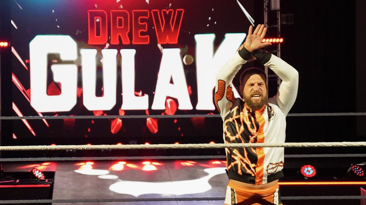 Drew Gulak poses in the ring during a WWE event