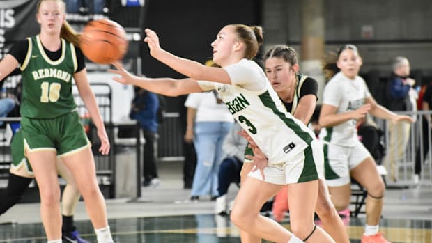Avery Hanson helped get Auburn off to a fast start, and the Trojans put away Redmond in the Class 4A girls tournament Wednesd