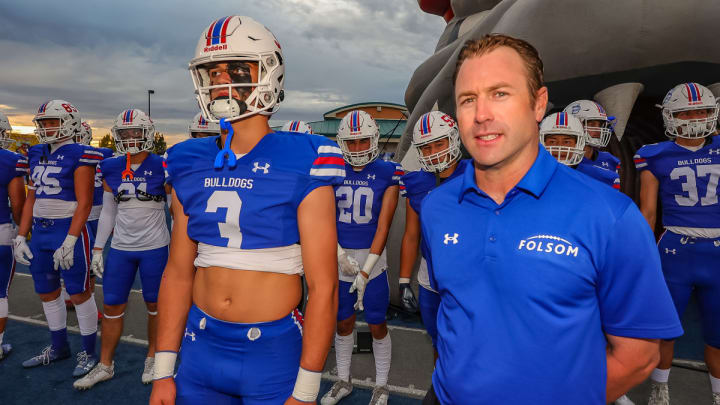 Ryder Lyons along with Folsom head coach Paul Doherty look on pregame before facing Oak Ridge.