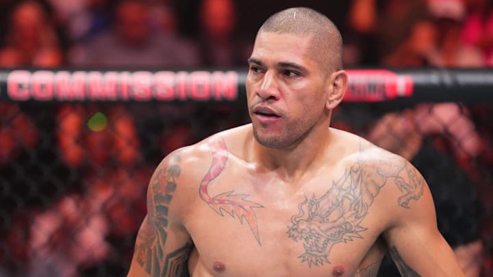 Alex Pereira looks on during a UFC fight. Alex Pereira looks on during a UFC fight.