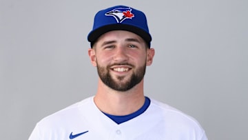 Mar 1, 2021; Dunedin, FL, USA; Toronto Blue Jays Adam Kloffenstein #84 poses during media day at TD Ballpark.