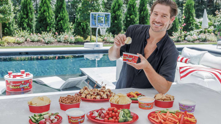Craig Conover partners with Heluva Good! Dip to celebrate the launch of the limited-edition Sunsational Dip Table that will help you throw the ultimate summer party. Image courtesy of Heluva Good!