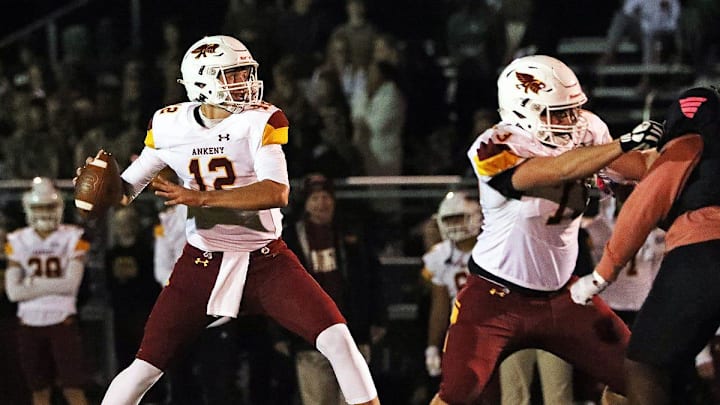Ankeny High senior quarterback and ISU recruit JJ Kohl (12) spots an open receiver as the Ankeny Hawks compete against the North High Polar Bears on Friday, October 7, 2022, at Grubb Stadium in Des Moines.
Dsm1009hawks A Ankeny High senior quarterback and ISU recruit JJ Kohl (12) spots an open receiver as the Ankeny Hawks compete against the North High Polar Bears on Friday, October 7, 2022, at Grubb Stadium in Des Moines.
Dsm1009hawks A