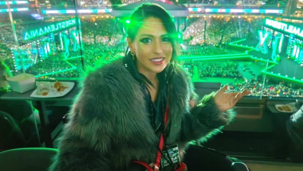 Giulia takes a picture at Lincoln Financial Field during WWE WrestleMania 40.