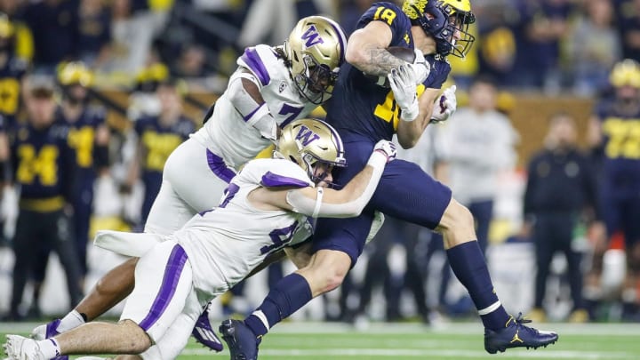 Carson Bruener pulls down Michigan tight end Colston Loveland in the CFP championship game.