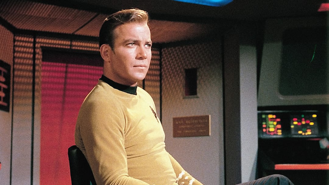 Pictured:  William Shatner as Captain James T. Kirk (Gold shirt) and Leonard Nimoy as Mr. Spock (Blue Shirt) in STAR TREK (The Original Series)