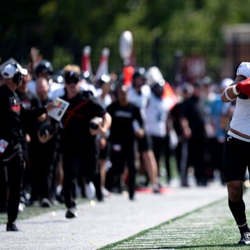 Cincinnati Bearcats tight end Joe Royer (11) stiff arms Miami Redhawks linebacker Oscar McWood (23) before the play is called back for holding in the fourth quarter of the College Football game at Yager Stadium in Cincinnati on Saturday, Sept. 14, 2024.