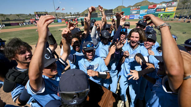 Camarillo (Calif.) players celebrate winning the CIF Southern Section Division 4 baseball championship at Lake Elsinore Diamond Stadium.