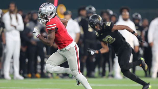 Jalen Lott races downfield during Lovejoy's Texas high school football playoff showdown with South Oak Cliff in November 2023