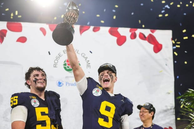 Michigan quarterback J.J. McCarthy lifts the Rose Bowl trophy to celebrate a 27-20 win over Alabama at the 2024 Rose Bowl