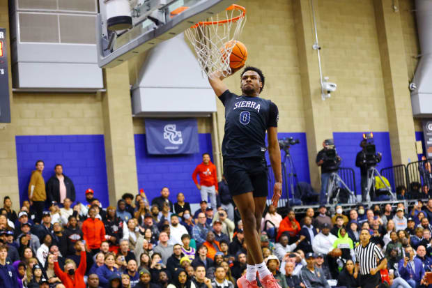 Bronny James soars in for a one-hand dunk against visiting Christ the King (New York) during his senior season.