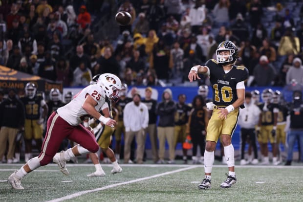 USC commit Julian Lewis throws a pass for Carrollton (Georgia) vs. Mill Creek during the 2022 high school football season.