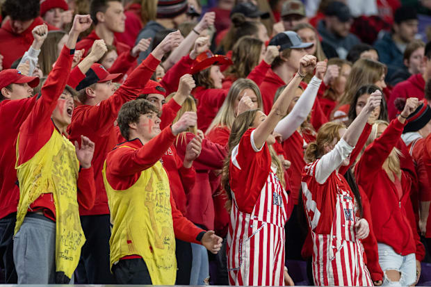 Mankato West fans cheer on their football team in 2022. Kamala Harris' choice for VP, Tim Walz, coached there in the '90s.