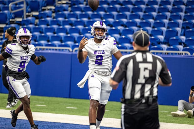 DJ Lagway tosses the ball to a ref after a touchdown in Willis' Texas high school football playoff loss to DeSoto in 2023.