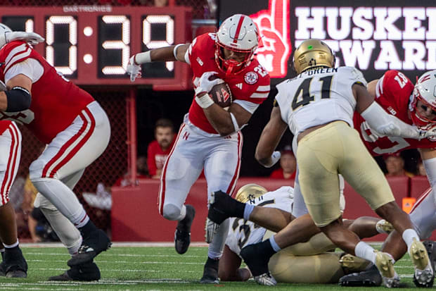 Nebraska running back Dante Dowdell rushes for a short gain in the second quarter against Colorado.