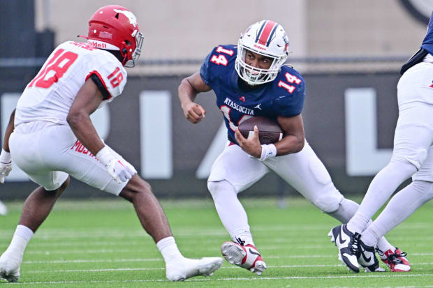 Charles Ross (left) readies for a tackle during North Shore's UIL (Texas) 6A Division I playoff win over Atascocita in Nov. 2